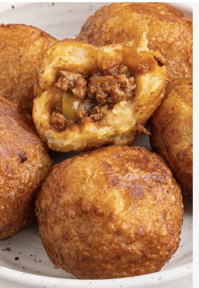 Golden stuffed potato balls with a savory filling